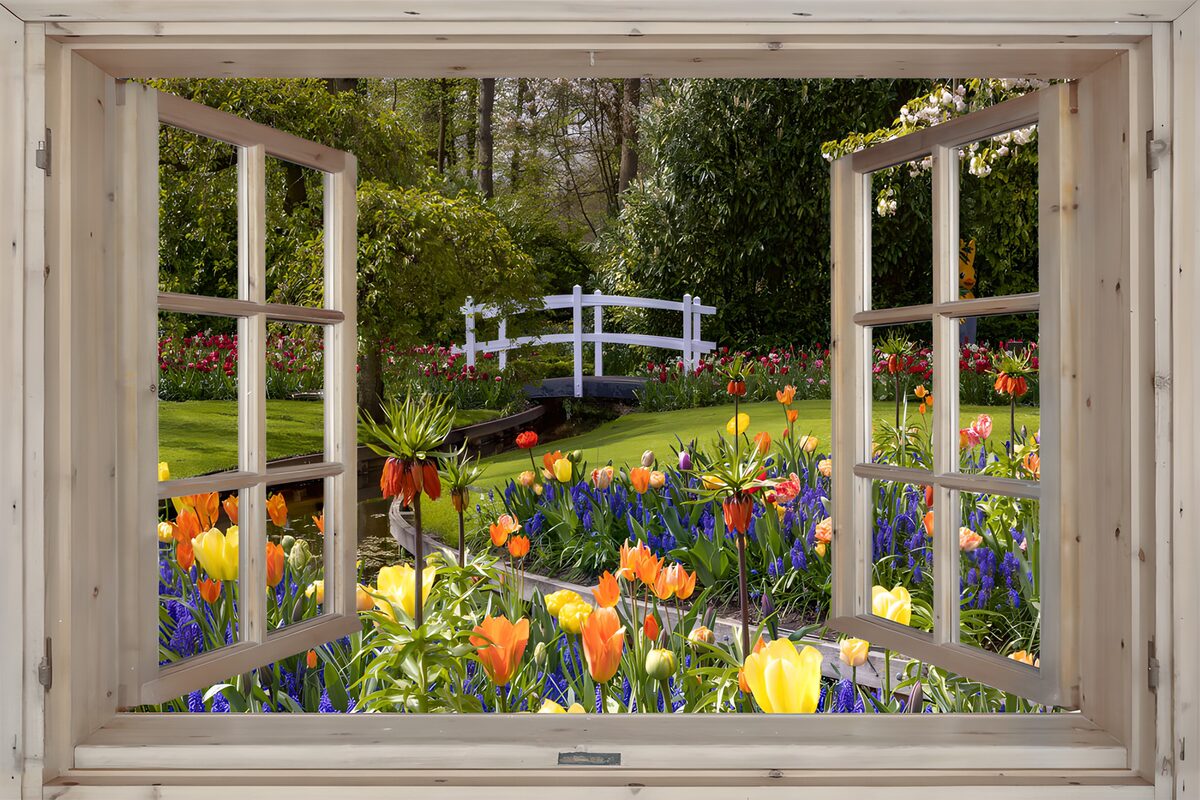 Open raam op een kleurrijke bloementuin