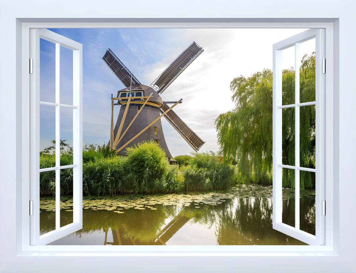 Open raam met molen aan het water